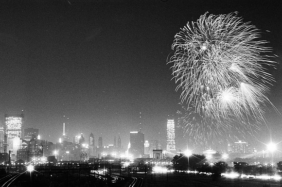 View of the American Legion Fourth of July fireworks display from outside of Soldier Field (ST-10003158-0005)