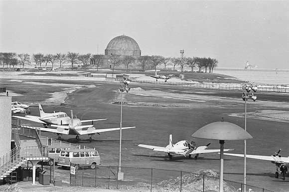 Planes land at Meigs Field Airport near the lakefront (ST-00000125-0013)