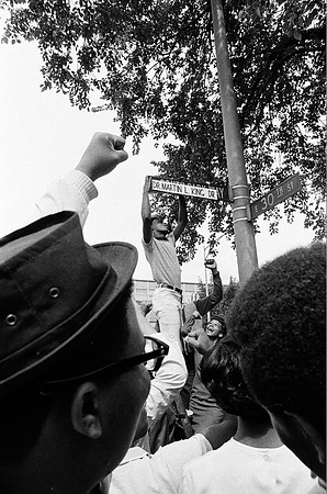 Students change street sign to Martin Luther King Drive (ST-14003604-0006)