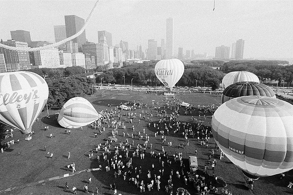Hot air balloons lift into the air in Grant Park for a race (ST-60001758-0031)
