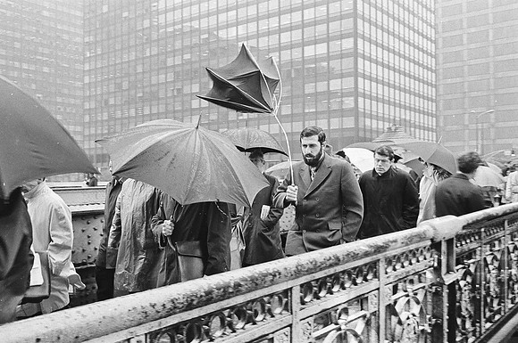 Commuters walk across the Madison Street Bridge in the rain (ST-20001408-0012)