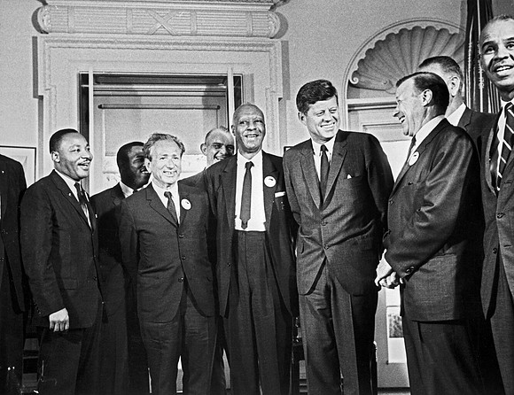 Martin Luther King and John F. Kennedy with civil rights leaders