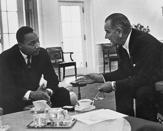 Martin Luther King Jr. meets with President Johnson at the White House.