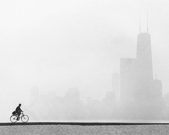 Fisherman on bicycle leaves the pier (ST-17500930)